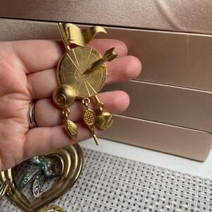 Gold Sports-Themed Brooch